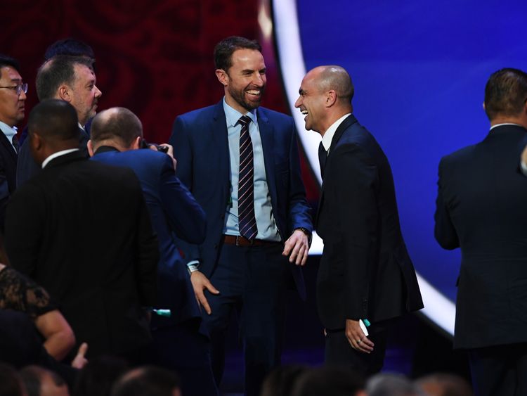 England manager Gareth Southgate and his Belgium counterpart Roberto Martinez joke together after their teams are drawn in the same World Cup group
