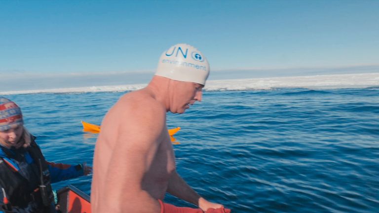 UN Patron of the Oceans Lewis Pugh preparing to swim near the Arctic ice sheet