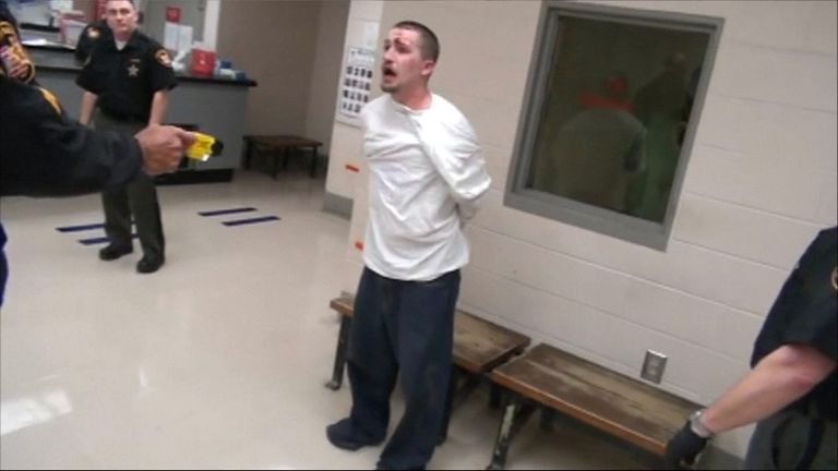 A guard fires a Taser at an inmate in Franklin County jail.