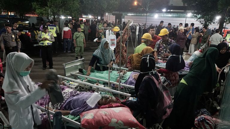 Patients were evacuated after their hospital was damaged. Pic: Antara Foto/Idhad Zakaria