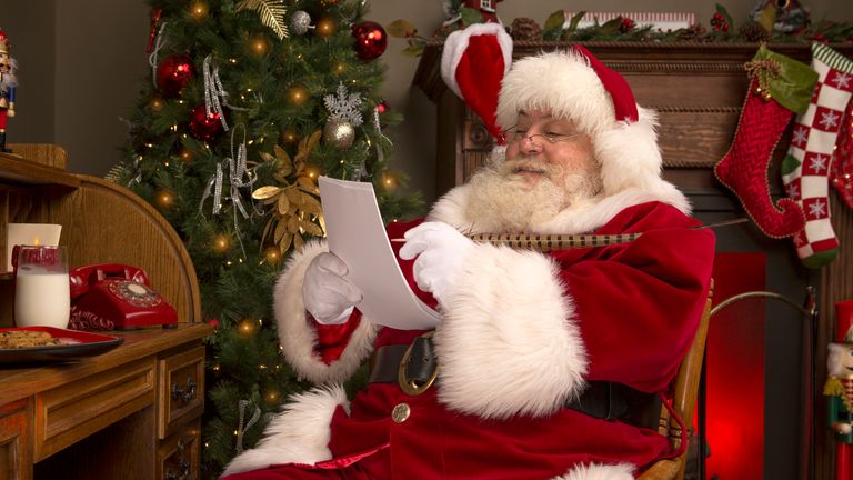 Portrait of the Real Santa Claus writing a letter