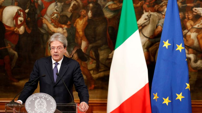 Italian Prime Minister Paolo Gentiloni attends a news conference 23 December
