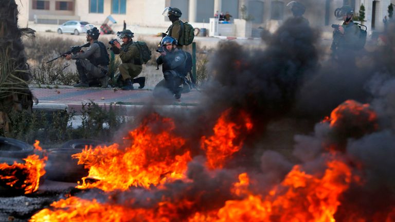 Israeli troops clash with Palestinian demonstrators in Ramallah