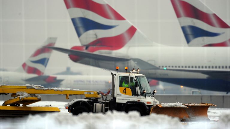 British Airways cancelled dozens of flights after disruption caused by the snow and ice
