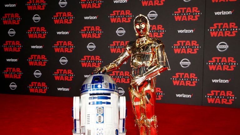 Droids R2-D2 and C-3PO posed on the red carpet