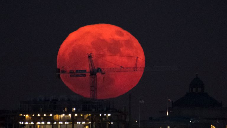The Moon is seen in Washington DC.  