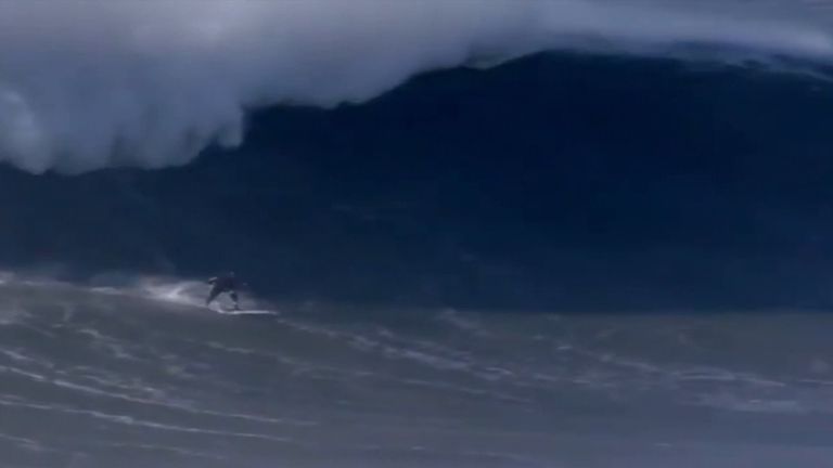 A surfer broke his back on a 50ft wave