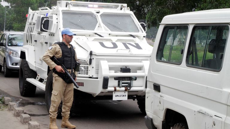 A UN peacekeeper patrols the streets during violent protests in the Democratic Republic of Congo&#39;s capital Kinshasa