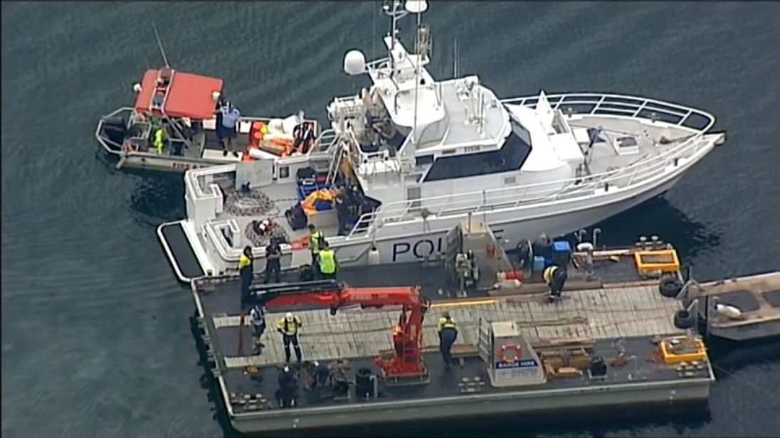 The seaplane is to be hoisted from the river where it crashed