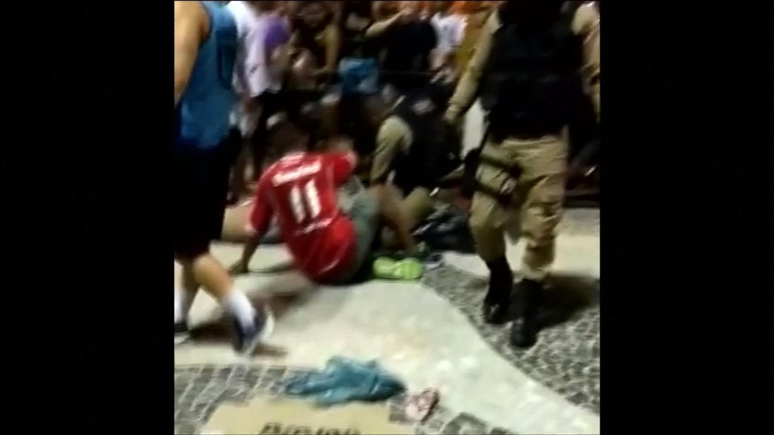 Car rams Rio beach crowd, killing baby & injuring 15 Car rams Rio beach crowd, killing baby & injuring 15