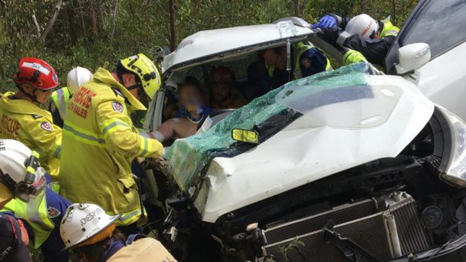 Dad finds son in Australia car wreck after hiring helicopter on a hunch