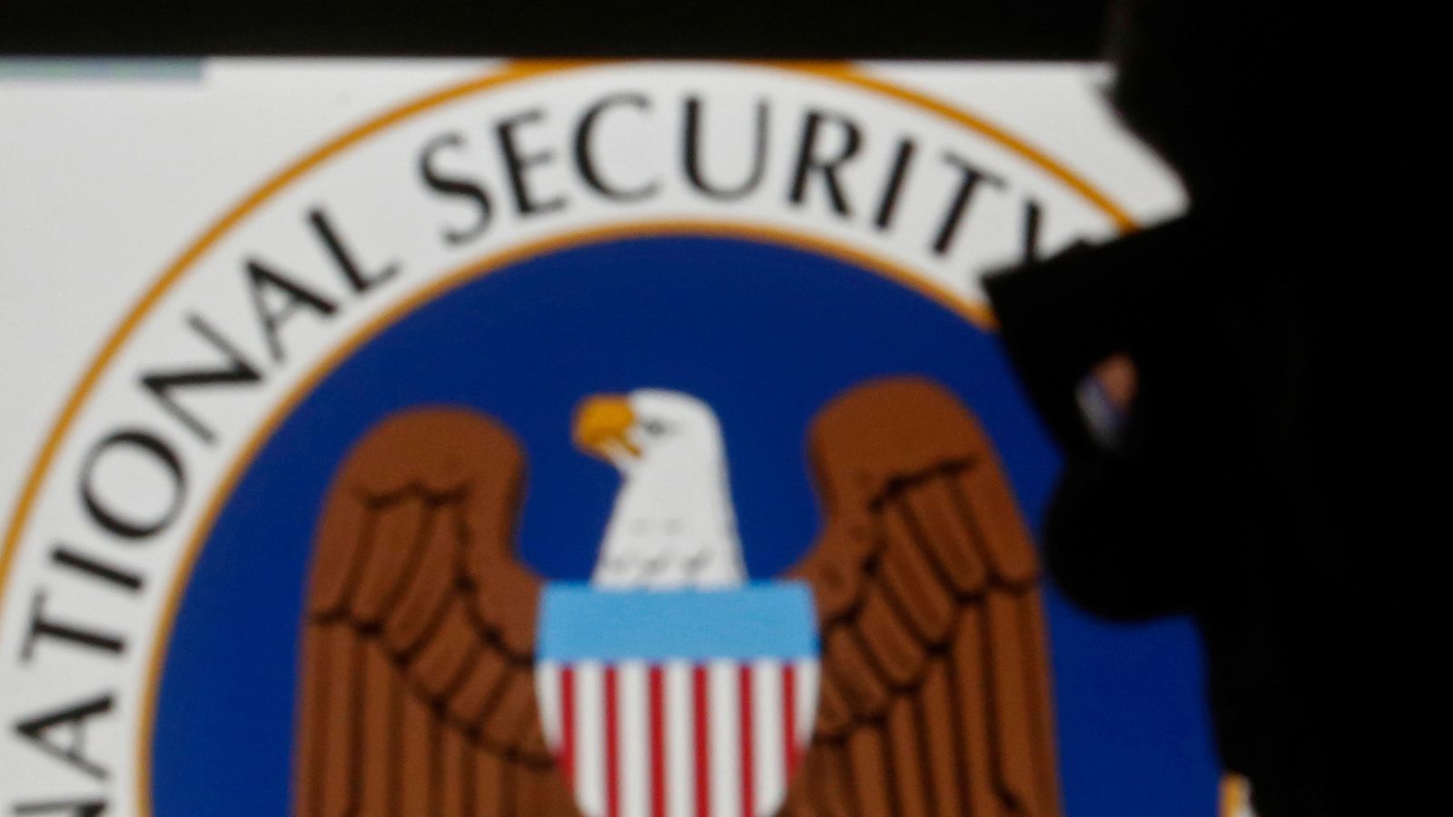 Trump in 'humiliating backpedal' over spying law