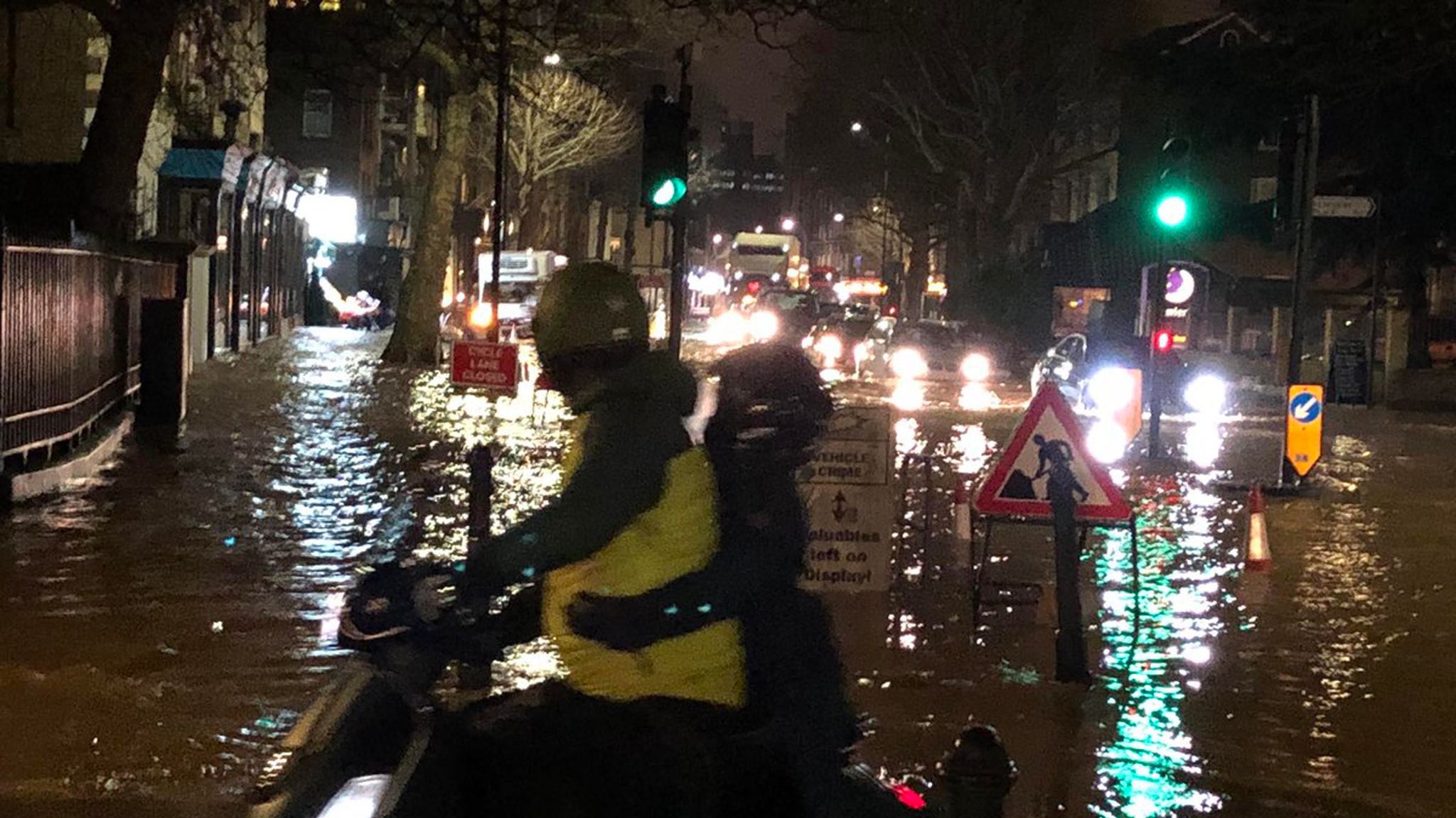 Motorists 'trapped in cars' after burst water main floods street | UK