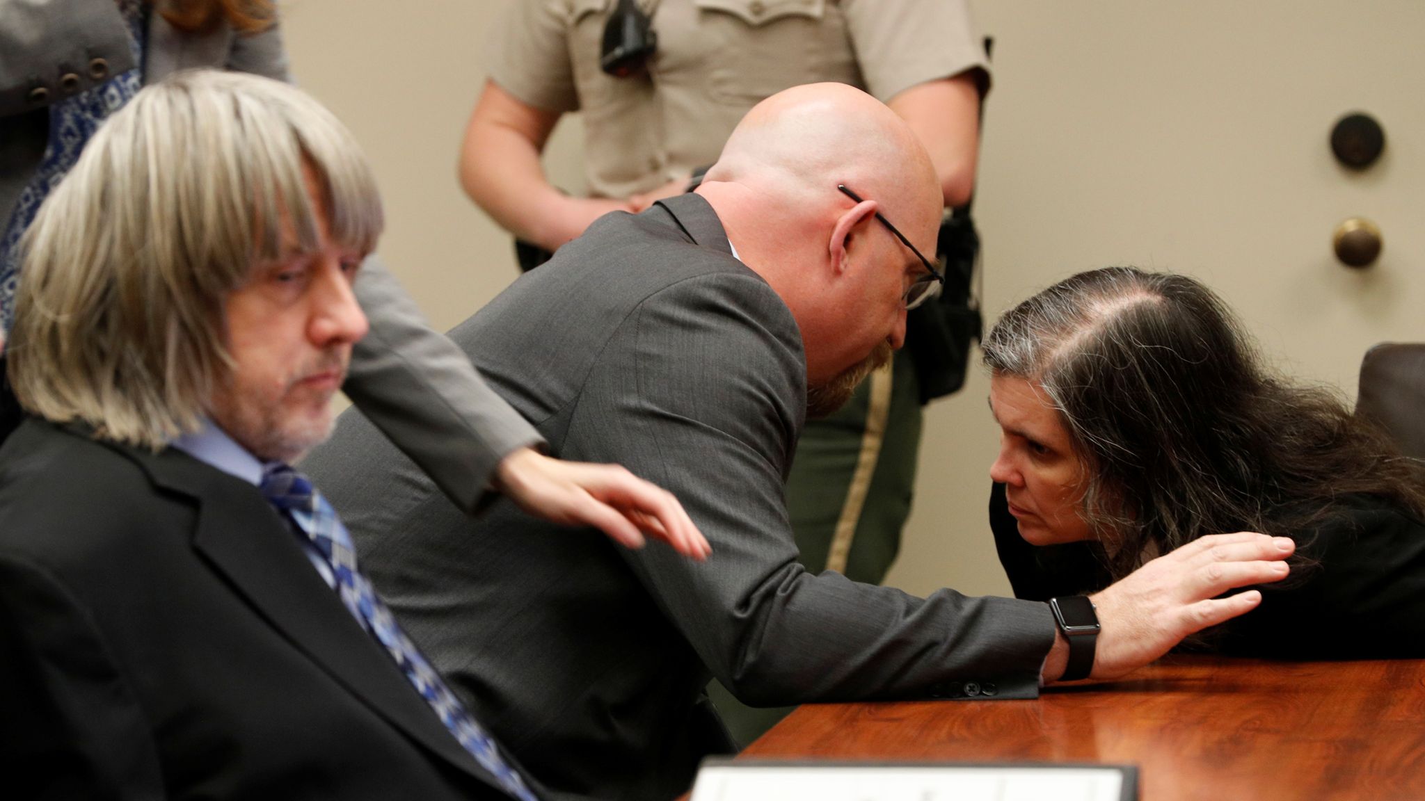 Smiling 'torture parents' banned from contacting their 13 kids US