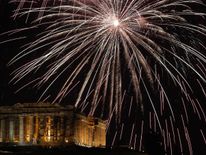 Fireworks explode over the ancient Parthenon temple atop the Acropolis hill during New Year's day celebrations in Athens, Greece, January 1, 2018