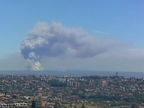 Thick black smoke could be seen billowing over the city