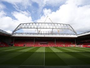 The new stand is seen under construction at the Anfield Stadium ahead of the English Premier League football match between Liverpool and West Ham at the Anfield stadium in Liverpool, north-west England on August 29, 2015. West Ham won the game 3-0. AFP PHOTO / LINDSEY PARNABY RESTRICTED TO EDITORIAL USE. No use with unauthorized audio, video, data, fixture lists, club/league logos or &#39;live&#39; services. Online in-match use limited to 75 images, no video emulation. No use in betting, games or single