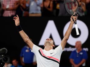 RTS1LGB228 Jan. 2018Melbourne, AustraliaTennis - Australian Open - Men&#39;s singles final - Rod Laver Arena, Melbourne, Australia, January 28, 2018. Switzerland&#39;s Roger Federer celebrates winning the final against Croatia&#39;s Marin Cilic. REUTERS/Issei Kato