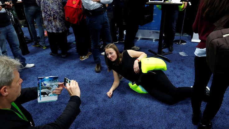 A  woman models Helite&#39;s Hip&#39;Air airbag for the elderly during CES Unveiled at the 2018 CES in Las Vegas