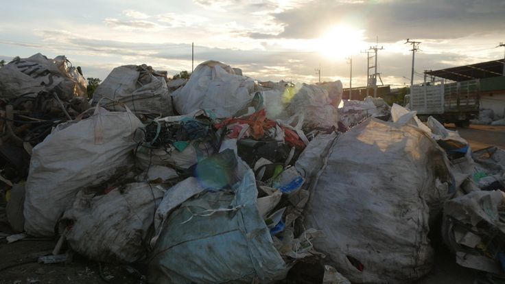 Plastic scrap sits on a yard in Thailand