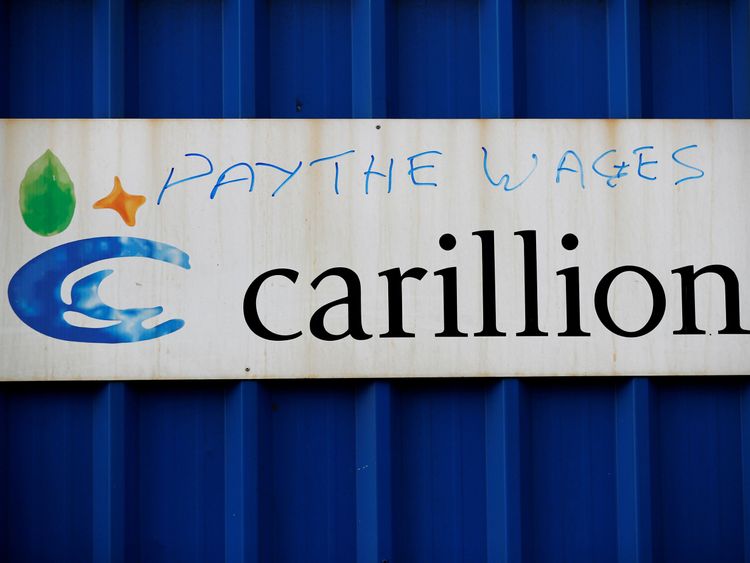 Defaced branding is seen outside Carillion&#39;s Royal Liverpool Hospital site