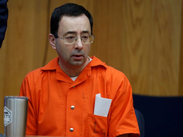 Larry Nassar sits in the courtroom as his third sentencing begins