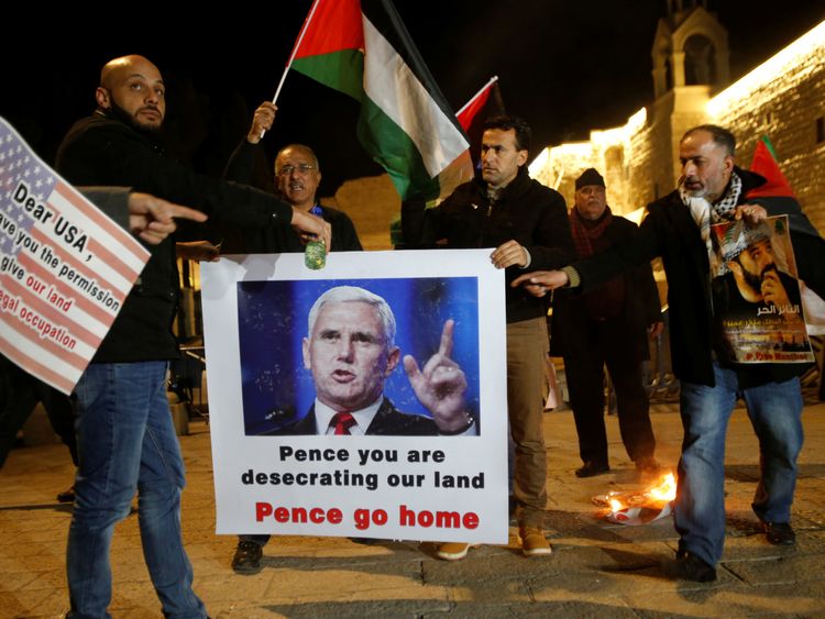 Palestinians take part in a protest against the visit of U.S. Vice President Mike Pence to Israel, in the West Bank city of Bethlehem January 21, 2018. REUTERS/Mussa Qawasma NO RESALES. NO ARCHIVES.