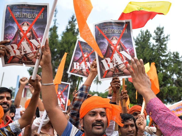 Members and activists of the Karnataka wing of Rashtriya Rajput Karni Sena caste organisation hold posters demanding the ban on screening of Bollywood movie &#39;Padmavathi&#39;, in Bangalore on November 15, 2017. The activists alleged that the movie directed by Sanjay Leela Bhansali at a cost of 1900 million Indian rupees distorts the historical facts. / AFP PHOTO / MANJUNATH KIRAN (Photo credit should read MANJUNATH KIRAN/AFP/Getty Images)