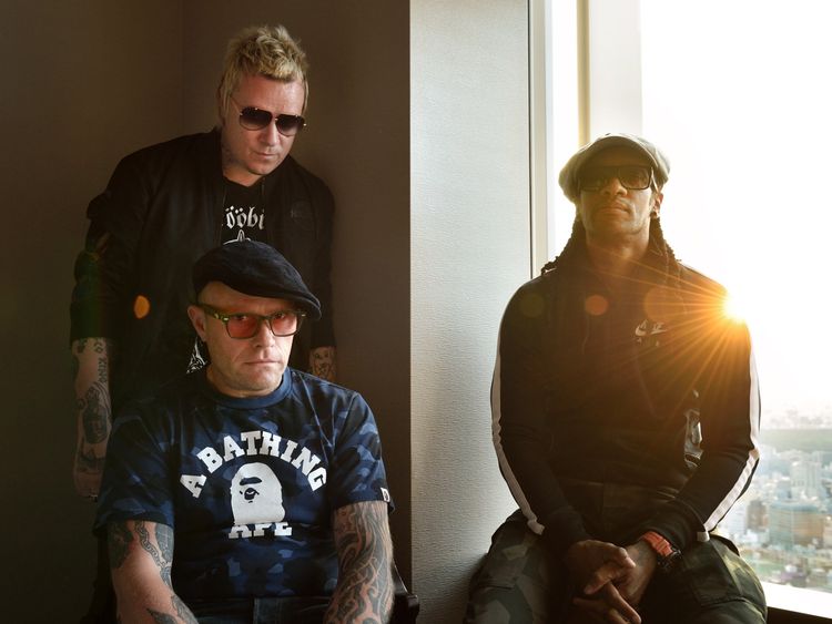 O GO WITH Britain-music-Prodigy-Japan-entertainment,INTERVIEW by Alastair HIMMER This photo taken on August 13, 2015 shows members of the British band The Prodigy, Liam Howlett (top L), Keith Flint (bottom L), and Maxim (R) posing prior to an interview in Tokyo. Techno-punk rockers The Prodigy, who took the world by storm with their angry lyrics and controversial videos in the 1990s, want to be viewed as a British &#39;national treasure.&#39; AFP PHOTO / KAZUHIRO NOGI (Photo credit should read KAZUHIRO 