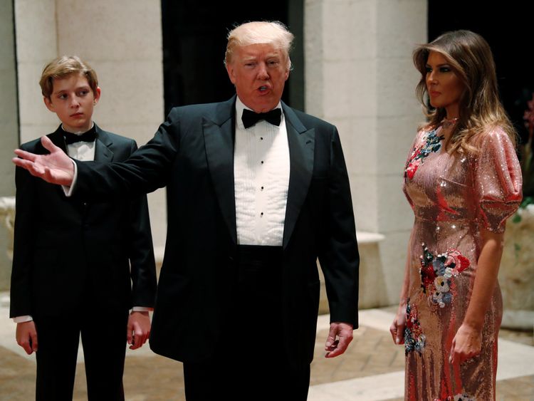Donald Trump and first lady Melania Trump, with their son Barron, on New Year's Eve