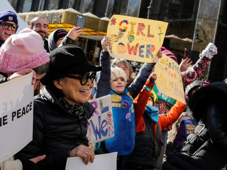 Artist Yoko Ono (L) takes part in the Women's March in Manhattan in New York City, New York, U.S., January 20, 2018. REUTERS/Eduardo Munoz
