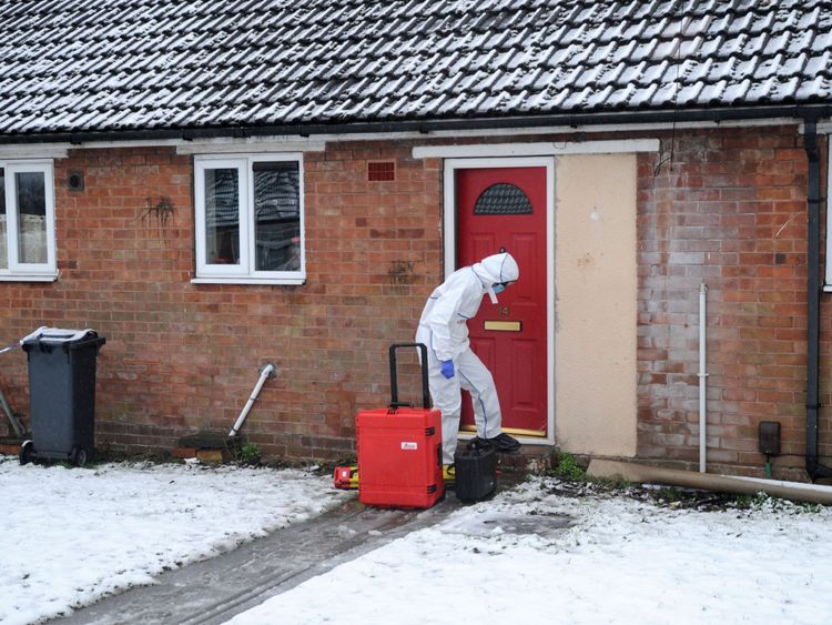 A police forensics officer at the property in Brownhills