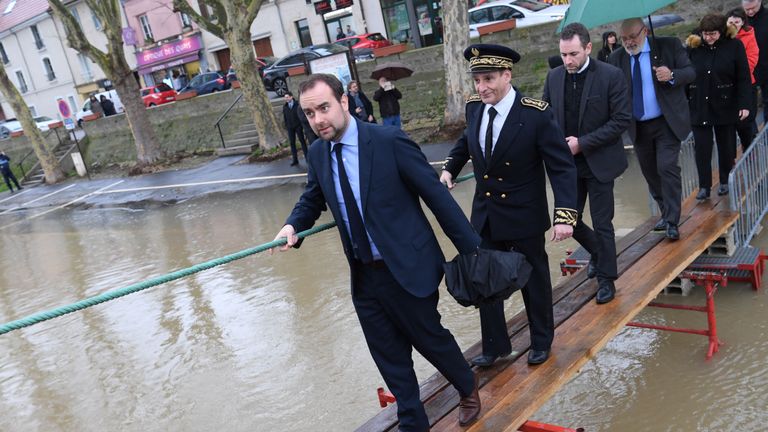 Ecology minister Sebastien Lecornu (l) visited Conflans-Sainte-Honorine outside Paris