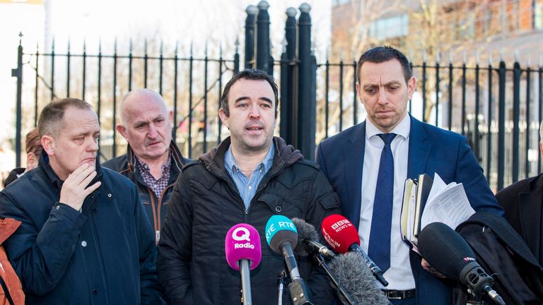 Kieran Fox (C), son of one of the victims, spoke out against the sentence