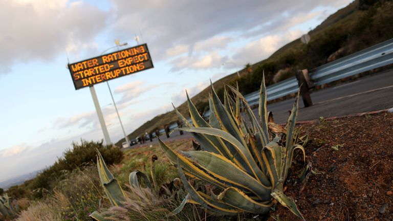 A sign warning residents of water restrictions