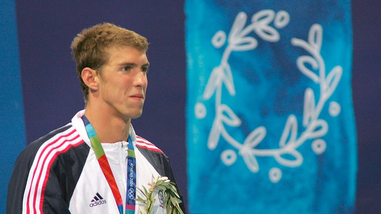 Michael Phelps wins gold at his first Olympic Games in Athens in 2004