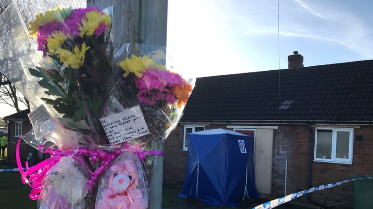 Flowers and teddy bears in remembrance of Mylee Billingham tied to a post outside the property in Brownhills, near Walsall, where the eight-year-old was found with fatal knife wounds on Saturday