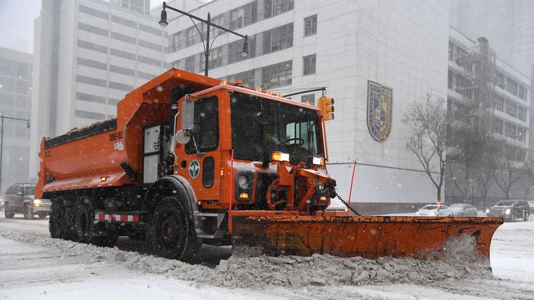 The winter storm has caused disruption to travel and the closure of schools in New York