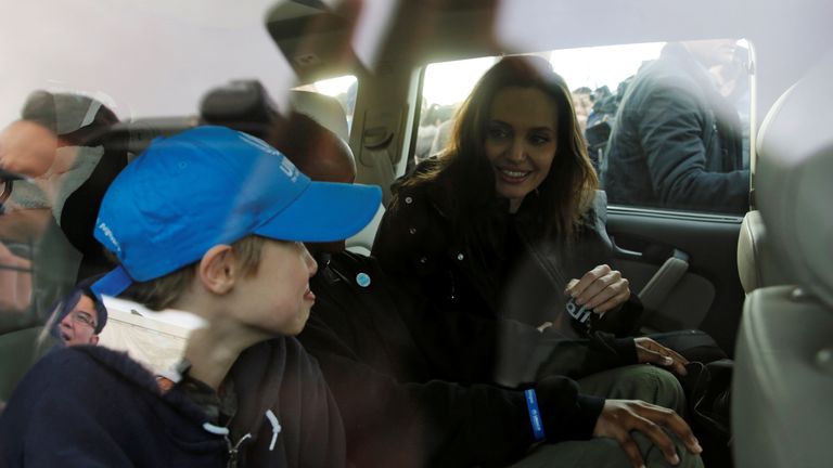 Angelina Jolie, was surrounded by children