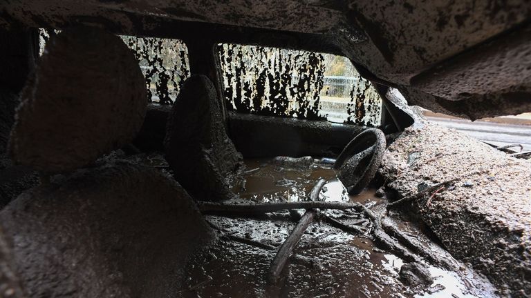 Mud fills the interior of a car destroyed in a rain-driven mudslide in a neighbourhood under mandatory evacuation in Burbank, California, January 9, 2018