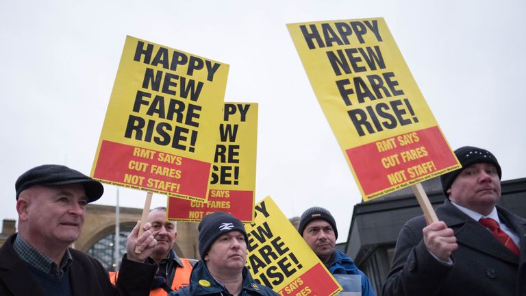 Campaigners protest against rail fare increases outside King&#39;s Cross station in London