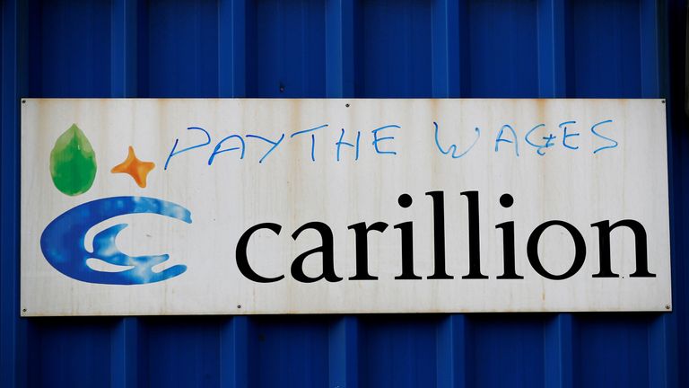 Defaced branding is seen outside Carillion&#39;s Royal Liverpool Hospital site