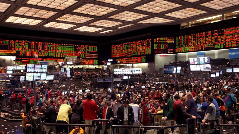 Traders work on the trading floor at the CME Group on February 11, 2011 in Chicago, Illinois.
