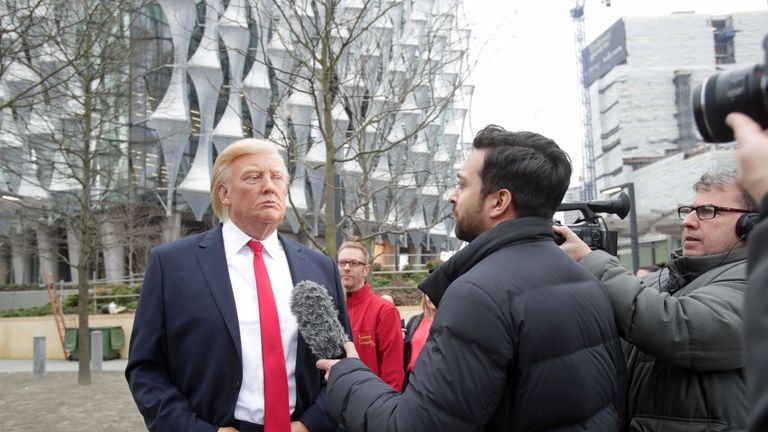 The Madame Tussauds wax figure of US President Donald Trump outside the new US Embassy in Nine Elms, London, after Mr Trump confirmed he will not travel to the UK to open the new building - and hit out at the location of the 1.2 billion dollar (�886 million) project.
