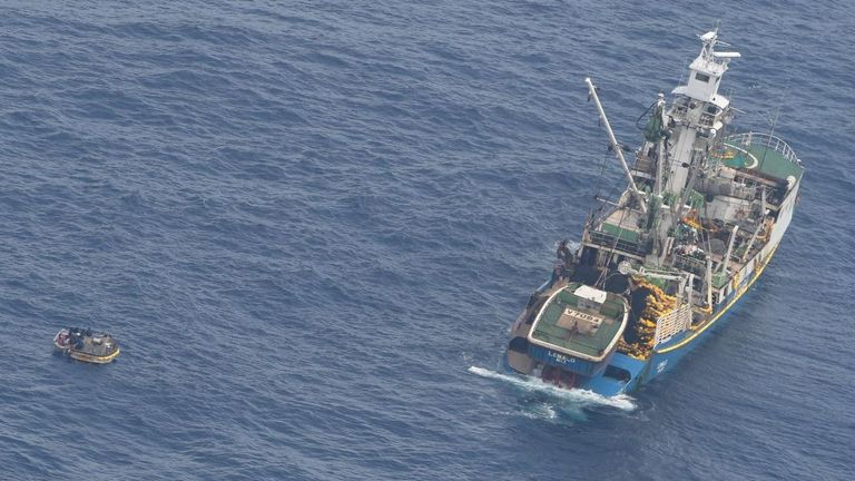 Seven people in a dinghy were found by the NZ Defence Force after a ferry capsized near Kiribati. Here they are rescued by a fishing vessel. Pic: NZ Defence Force