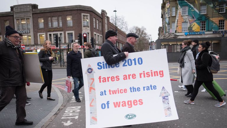 Campaigners protest against rail fare increases outside King&#39;s Cross station in London.