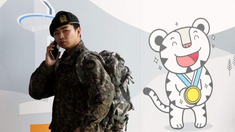 A South Korean soldier at the 2018 PyeongChang Winter Olympic and Paralympic Games PR booth 