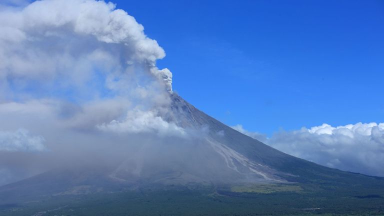 Ash spews from the Mayon volcano as it continues to erupt