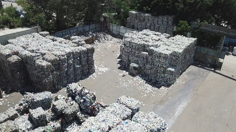 Plastics recycling that was exported from the UK has been left on a yard in Hong Kong, now destined for landfill