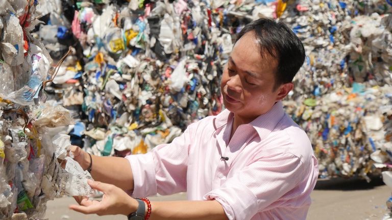 Plastics trader Tony Wong inspects plastic recycling that originally came from Chelmsford Council